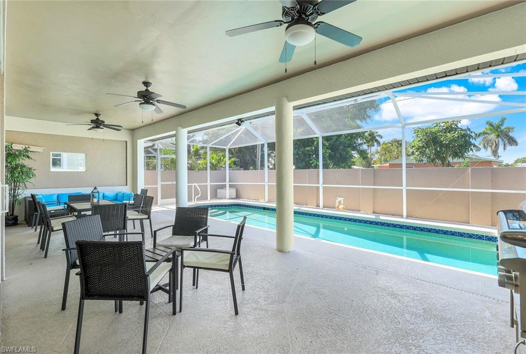 746 101st Avenue North Naples, FL 34108 - Photo 22 of 33 a view of a dining room with furniture window and outside view
