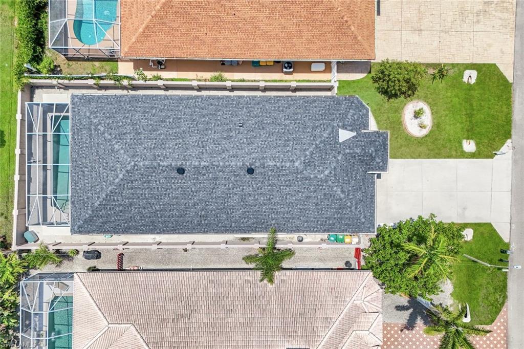 746 101st Avenue North Naples, FL 34108 - Photo 28 of 33 a view of a brick wall with a outdoor space