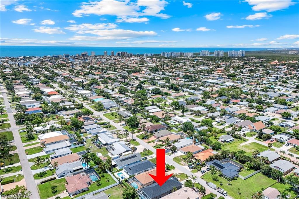 746 101st Avenue North Naples, FL 34108 - Photo 31 of 33 an aerial view of residential houses with city view