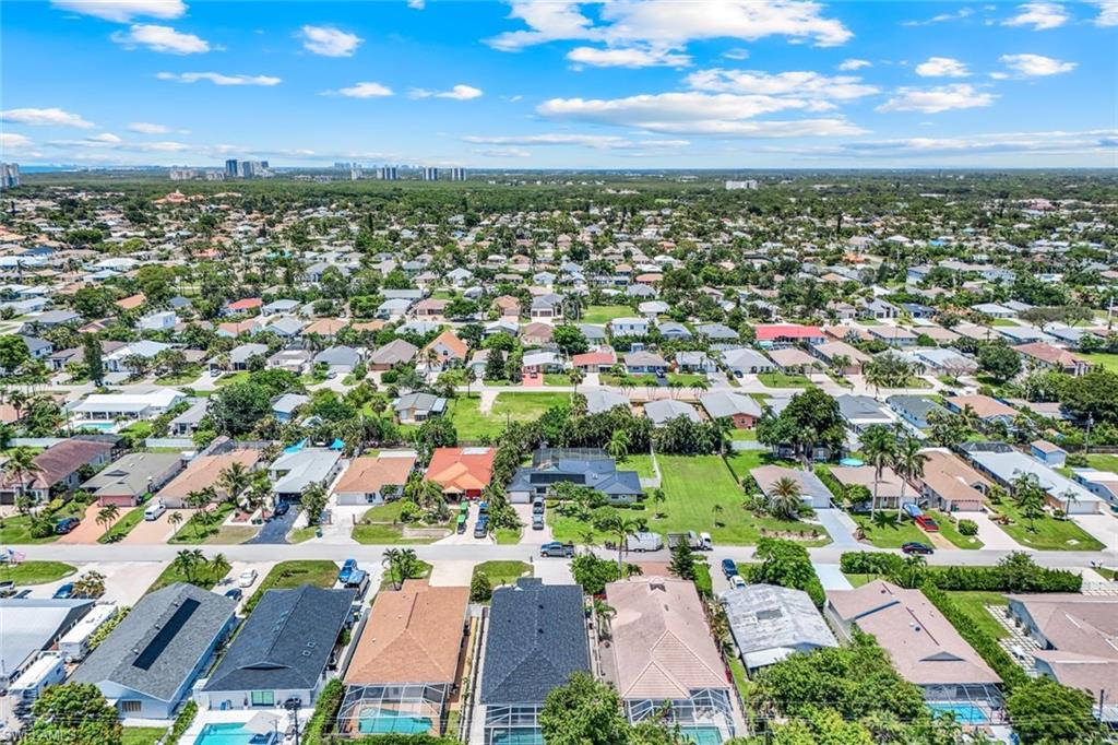 746 101st Avenue North Naples, FL 34108 - Photo 32 of 33 an aerial view of a city