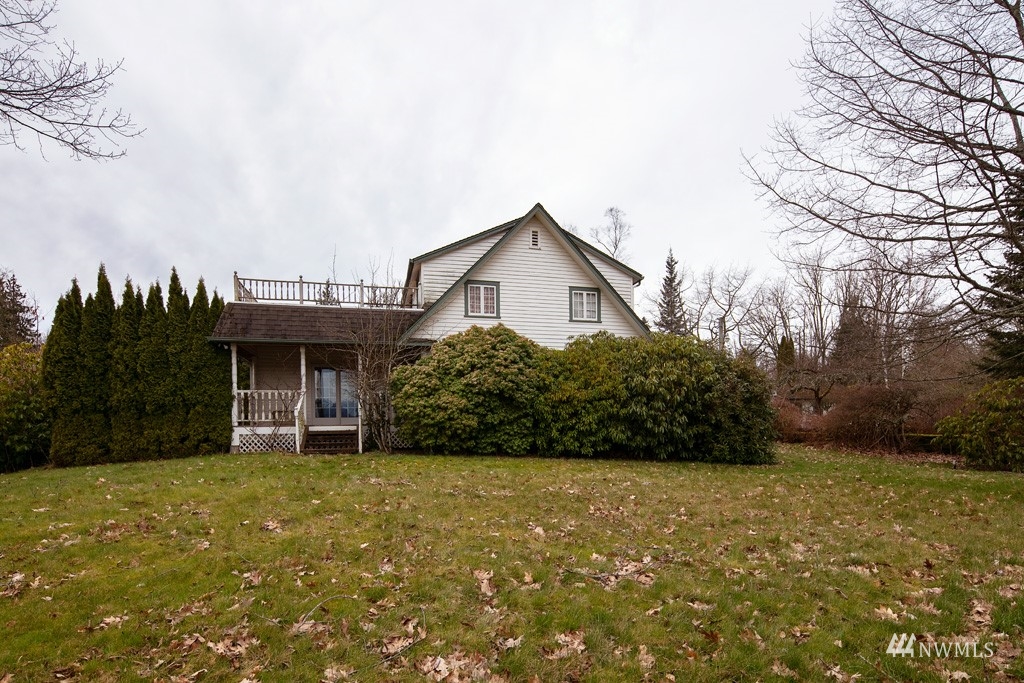 5435 Sand Road Bellingham, WA 98226 - Photo 35 of 38 a front view of a house with a yard