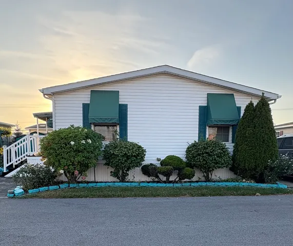 a house that has a lot of plants in it