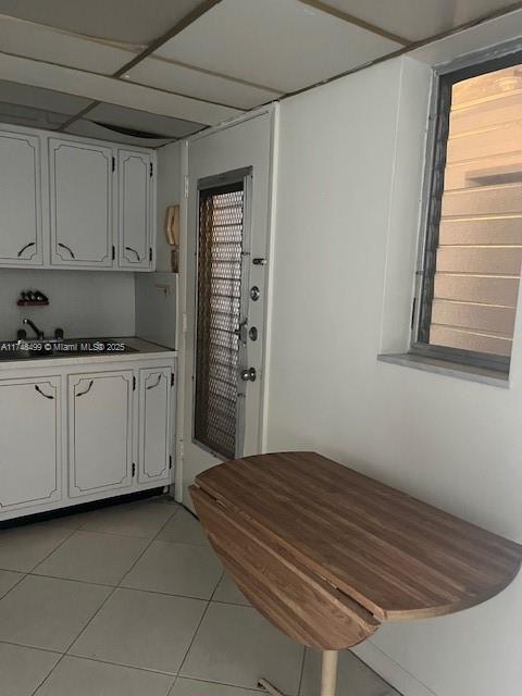 1662 Lincoln Court, Unit 508 Miami Beach, FL 33139 - Photo 16 of 20 a bedroom with a bed and cabinets