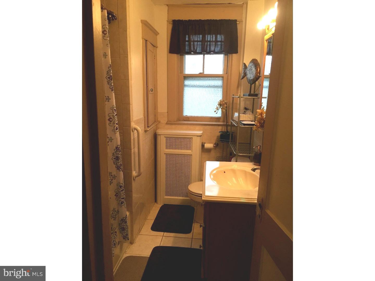 525 Holly Road Yeadon, PA 19050 - Photo 13 of 25 a bathroom with a toilet