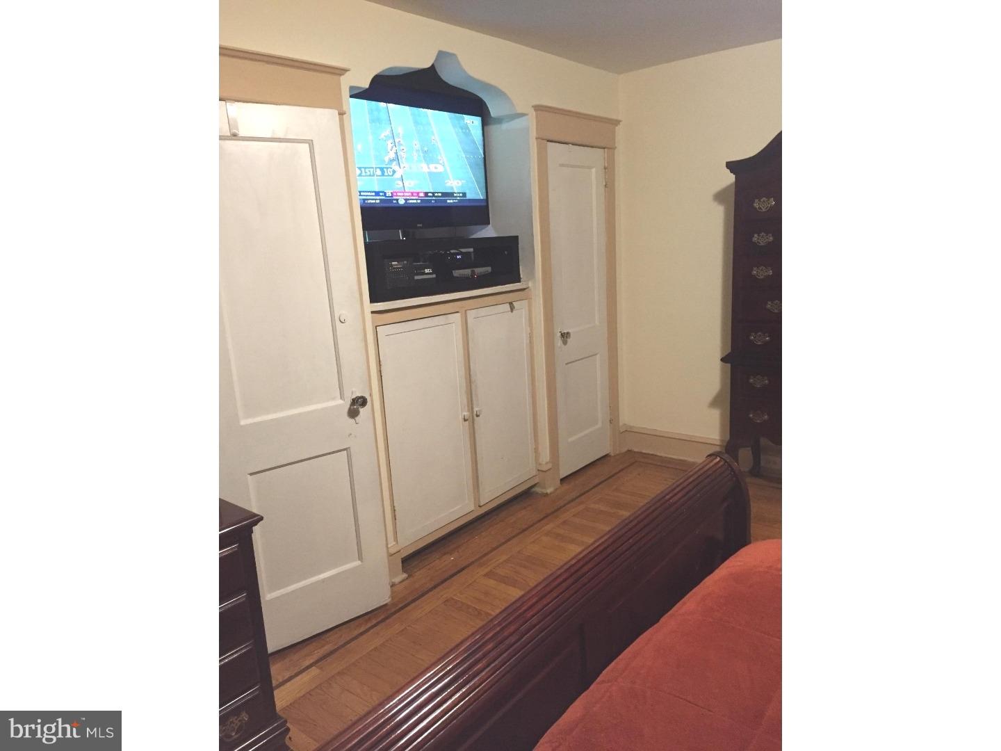525 Holly Road Yeadon, PA 19050 - Photo 22 of 25 a view of a bedroom from a hallway
