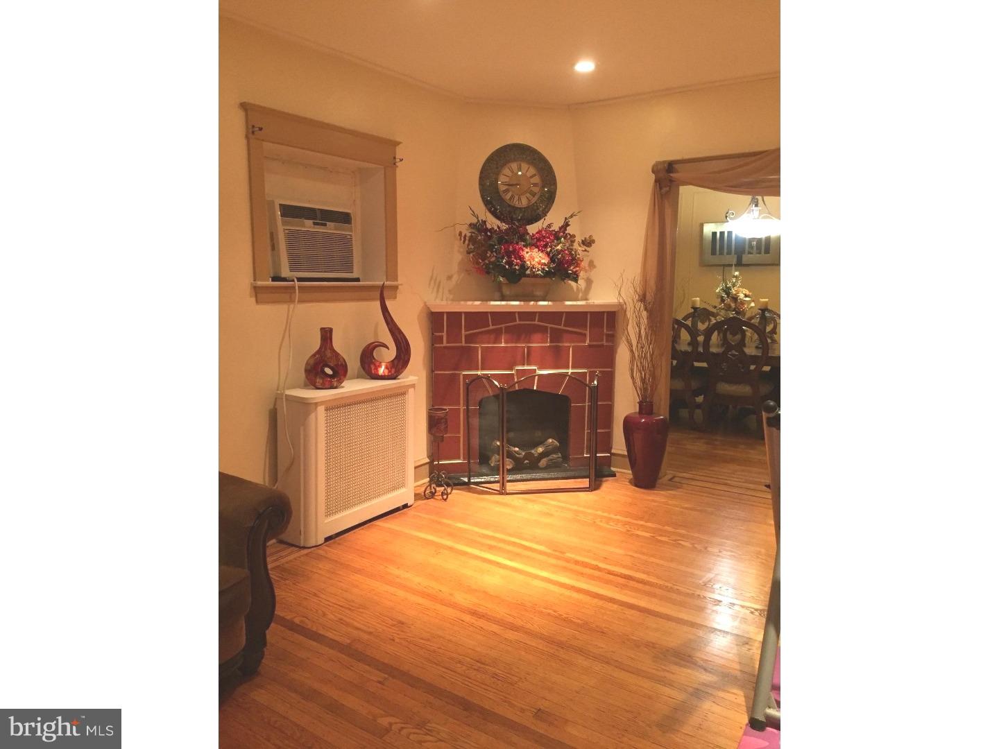 525 Holly Road Yeadon, PA 19050 - Photo 4 of 25 a view of a fireplace with a sink