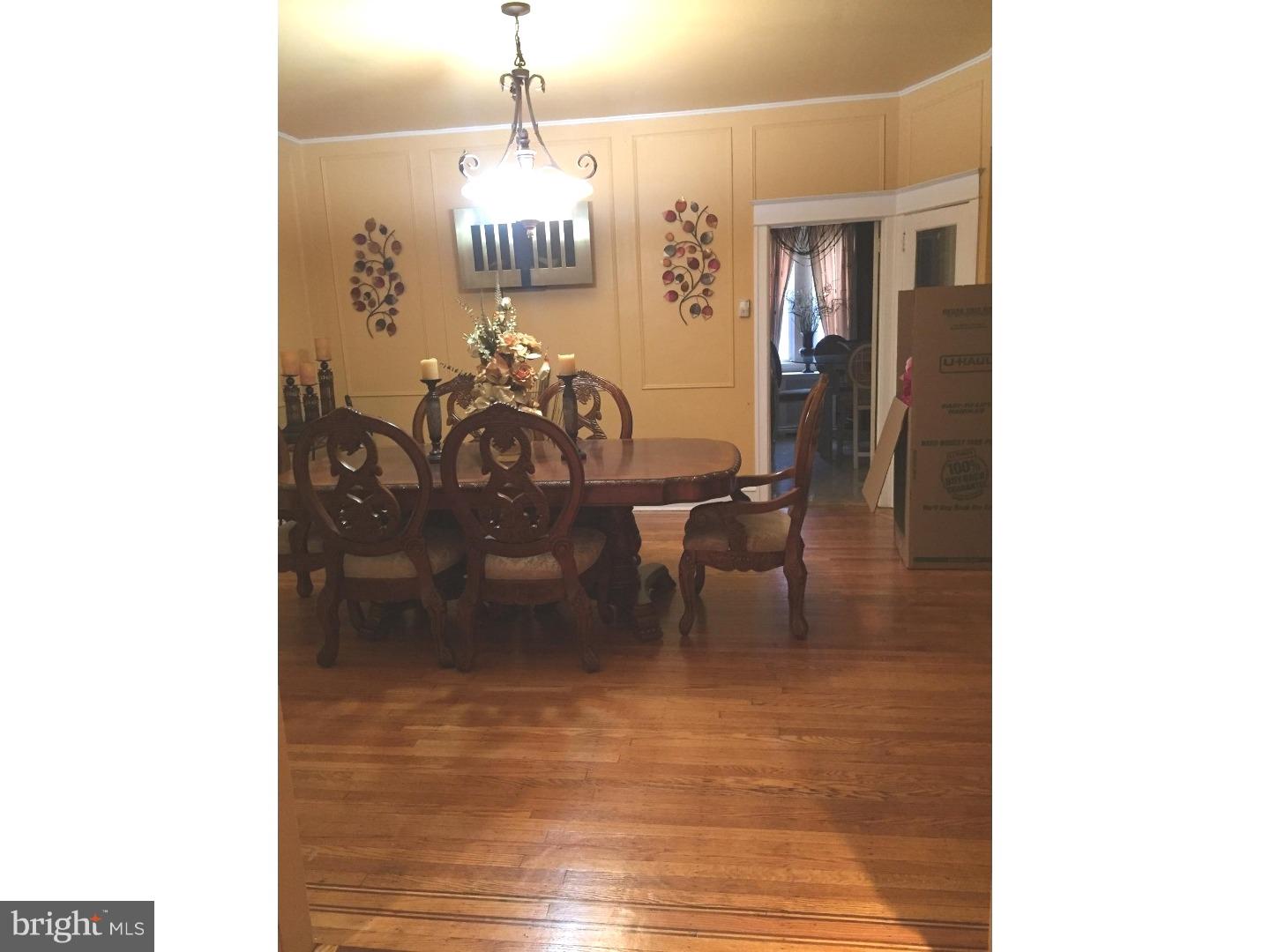 525 Holly Road Yeadon, PA 19050 - Photo 5 of 25 a view of a room with a dining table chairs and entryway