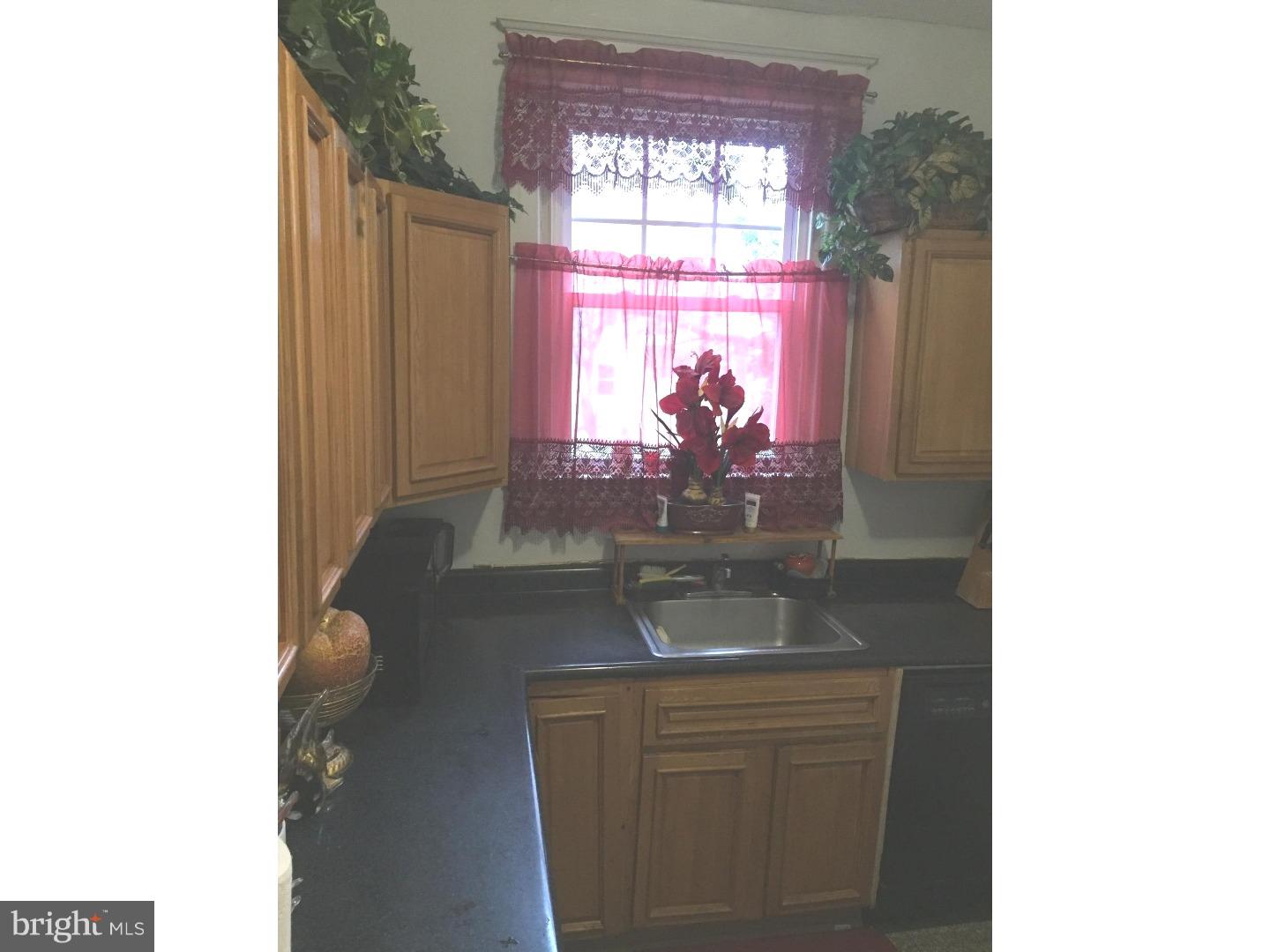 525 Holly Road Yeadon, PA 19050 - Photo 9 of 25 a room with a window