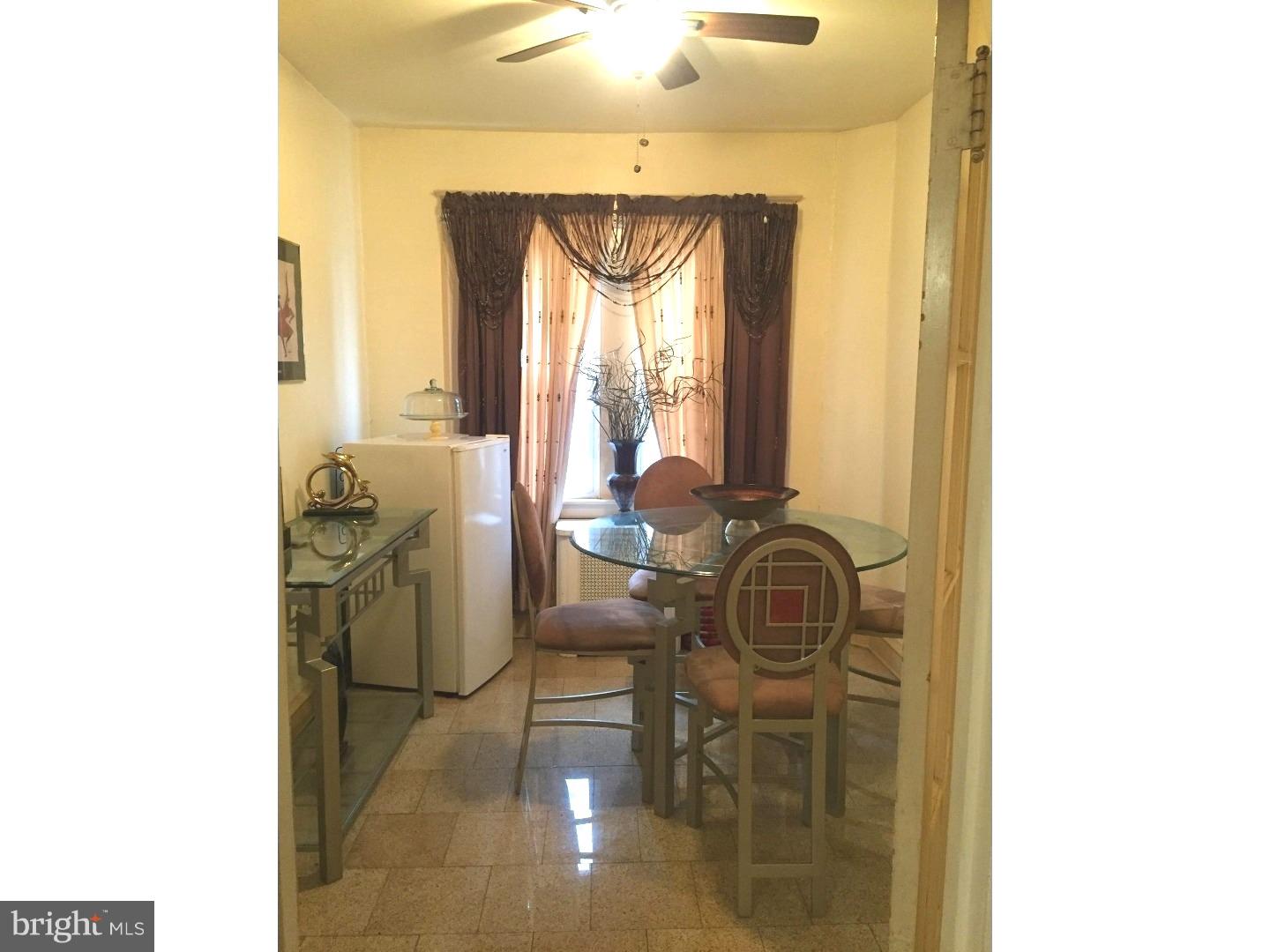 525 Holly Road Yeadon, PA 19050 - Photo 10 of 25 a room with furniture and a window