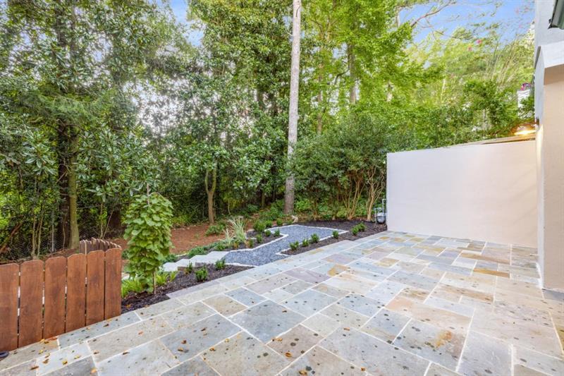 650 Moores Mill Road Northwest, Unit 11 Atlanta, GA 30327 - Photo 29 of 31 a view of a backyard