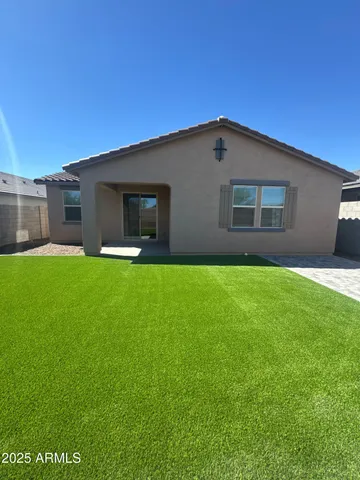a house view with a garden space
