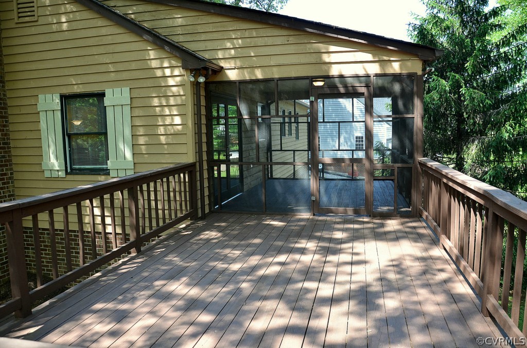 4940 Windsor Road Sandston, VA 23150 - Photo 20 of 22 a view of a porch with wooden floor and fence