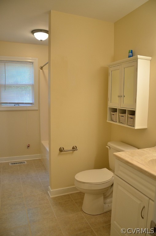 4940 Windsor Road Sandston, VA 23150 - Photo 9 of 22 a bathroom with a granite countertop toilet and a sink