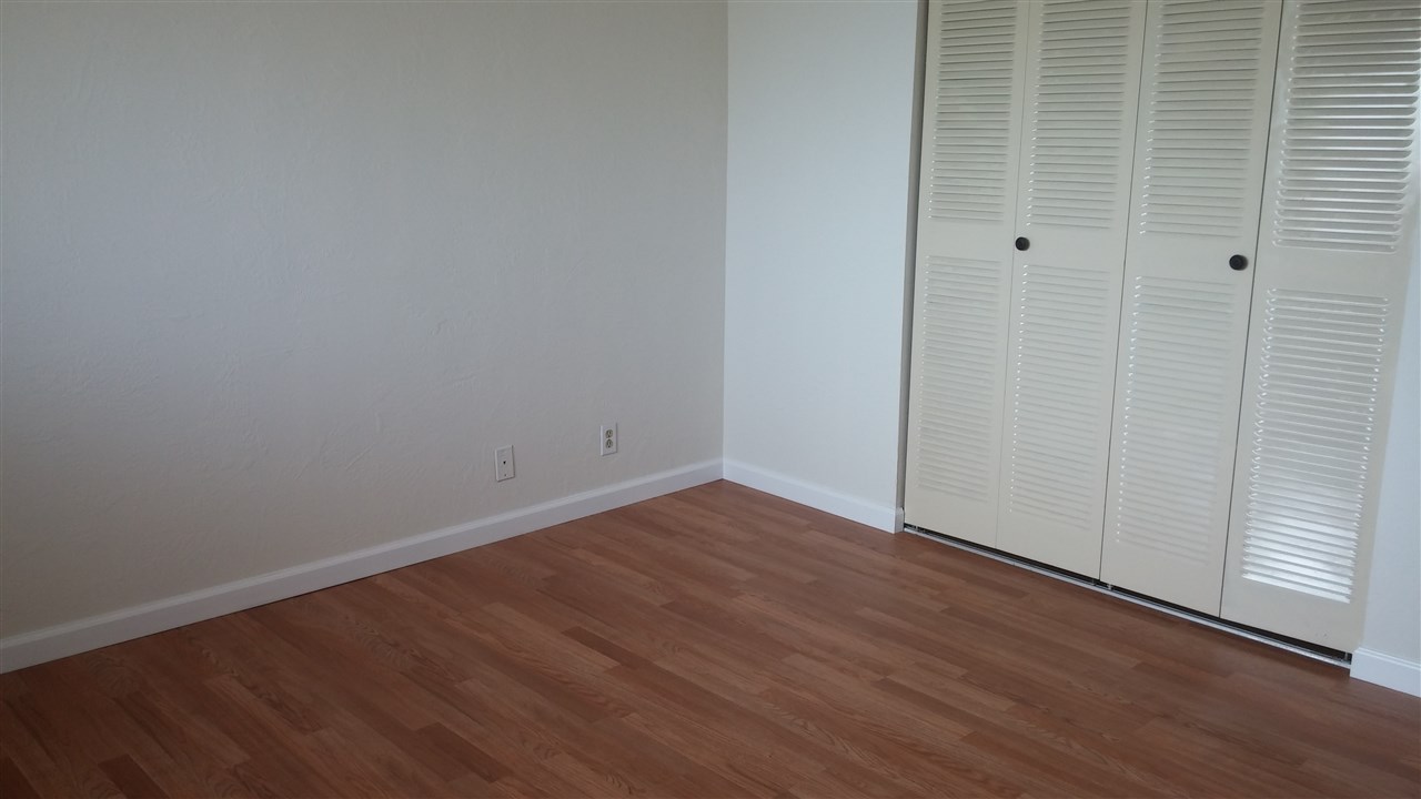760 South Kihei Road, Unit 225 Kihei, HI 96753 - Photo 11 of 14 an empty room with wooden floor