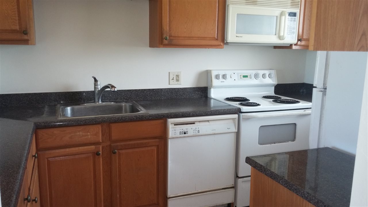 760 South Kihei Road, Unit 225 Kihei, HI 96753 - Photo 7 of 14 a view of a kitchen with sink and cabinets