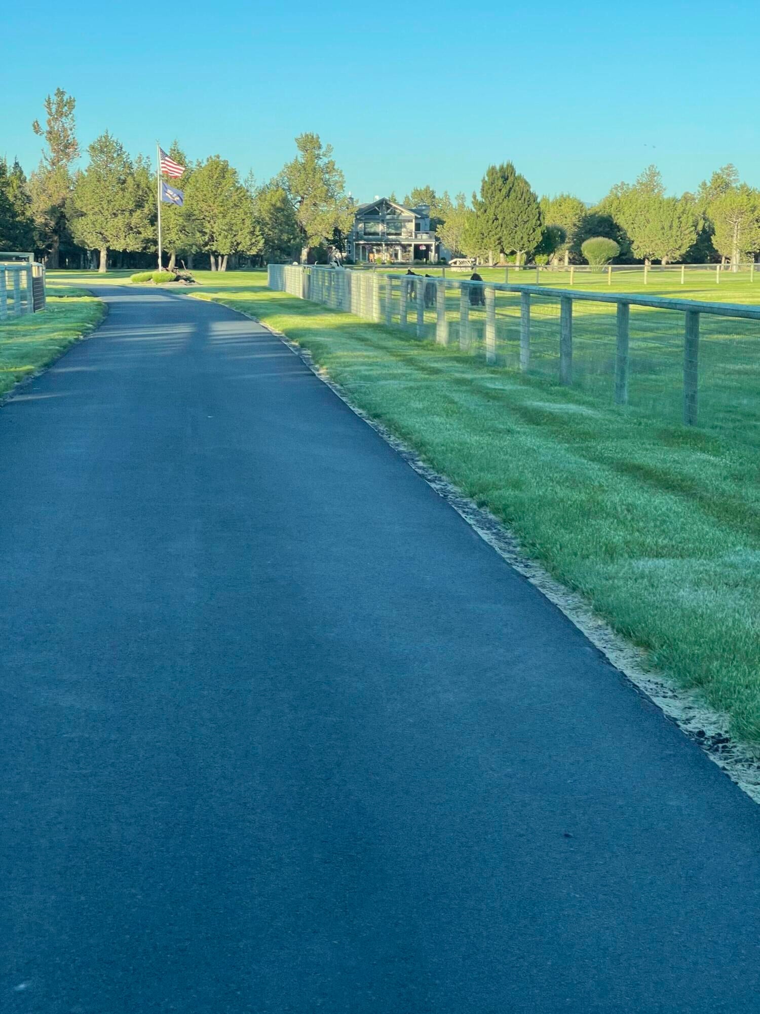 66250 Gerking Market Road Bend, OR 97703 - Photo 38 of 86 Newly paved 700 ft driveway with lush pastures on either side