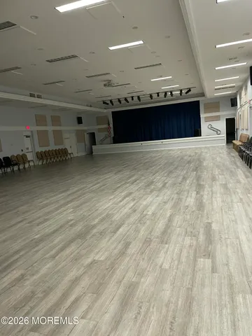 a view of a hall with an empty space