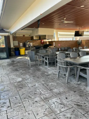 a view of a big room with gym equipment