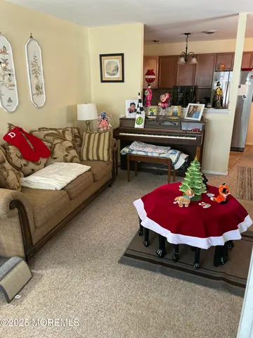 a living room with furniture and rug
