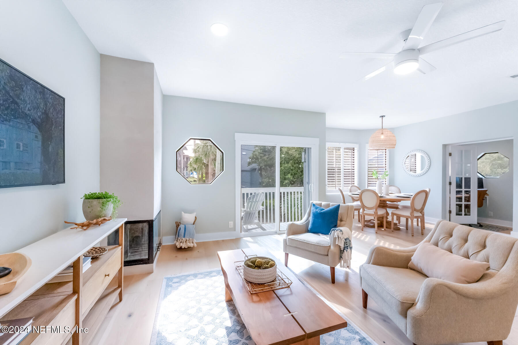 1850 Beach Avenue Atlantic Beach, FL 32233 - Photo 12 of 52 a living room with furniture a rug and a window