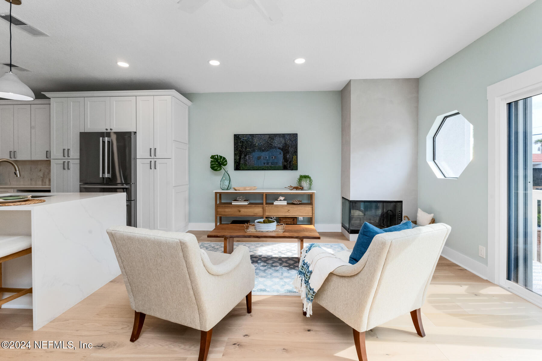 1850 Beach Avenue Atlantic Beach, FL 32233 - Photo 13 of 52 a living room with furniture and a flat screen tv