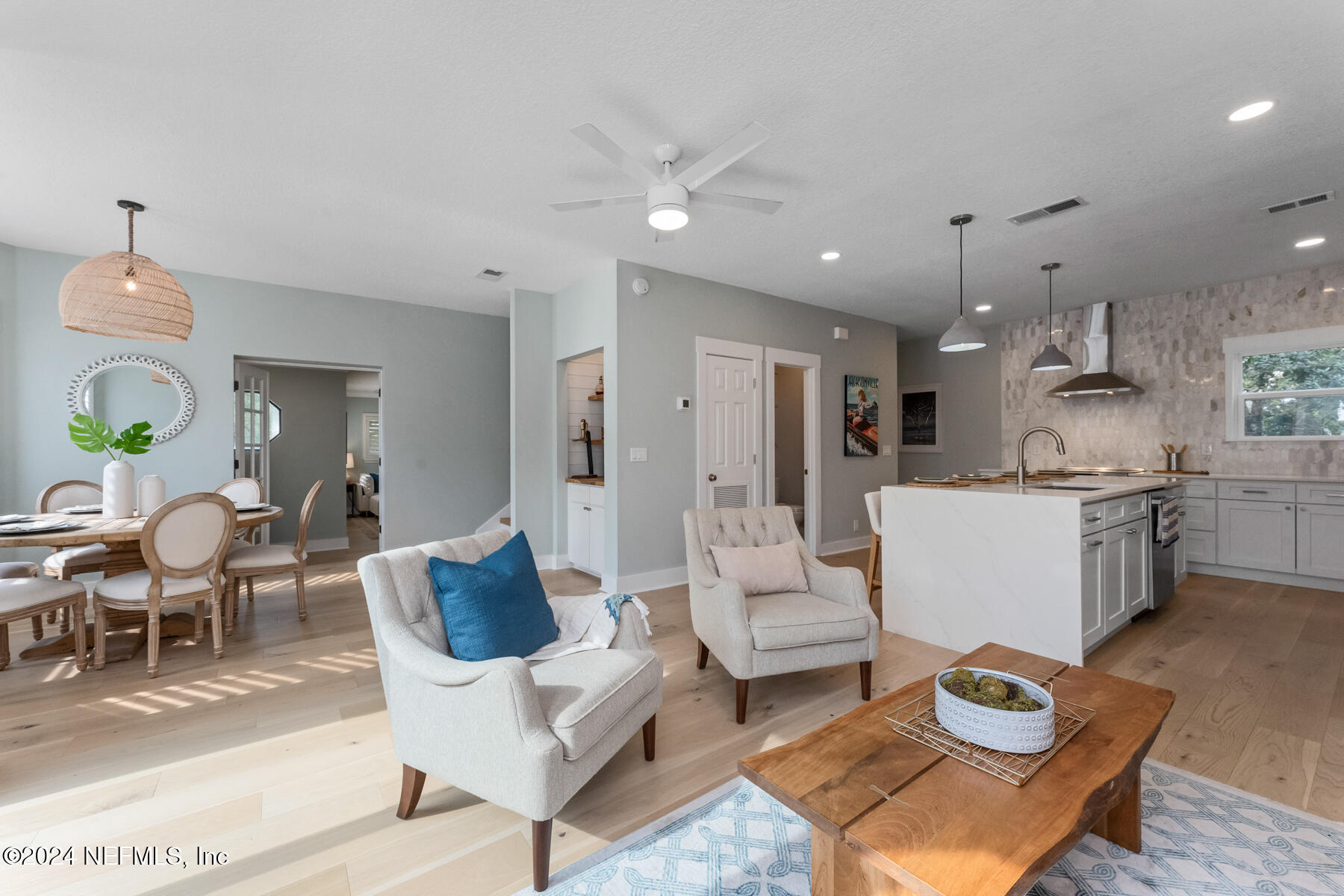 1850 Beach Avenue Atlantic Beach, FL 32233 - Photo 15 of 52 a living room with lots of furniture and kitchen view