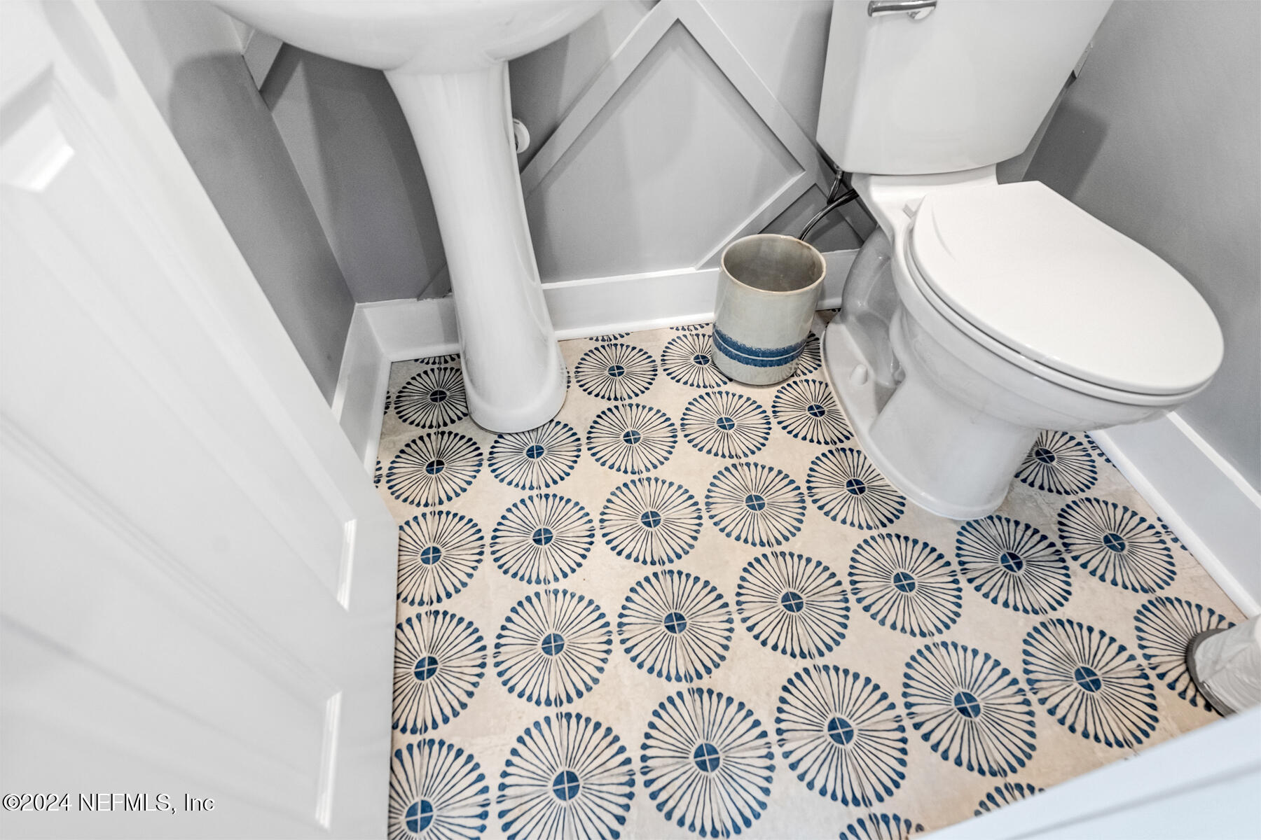 1850 Beach Avenue Atlantic Beach, FL 32233 - Photo 21 of 52 a bathroom with a toilet and a sink