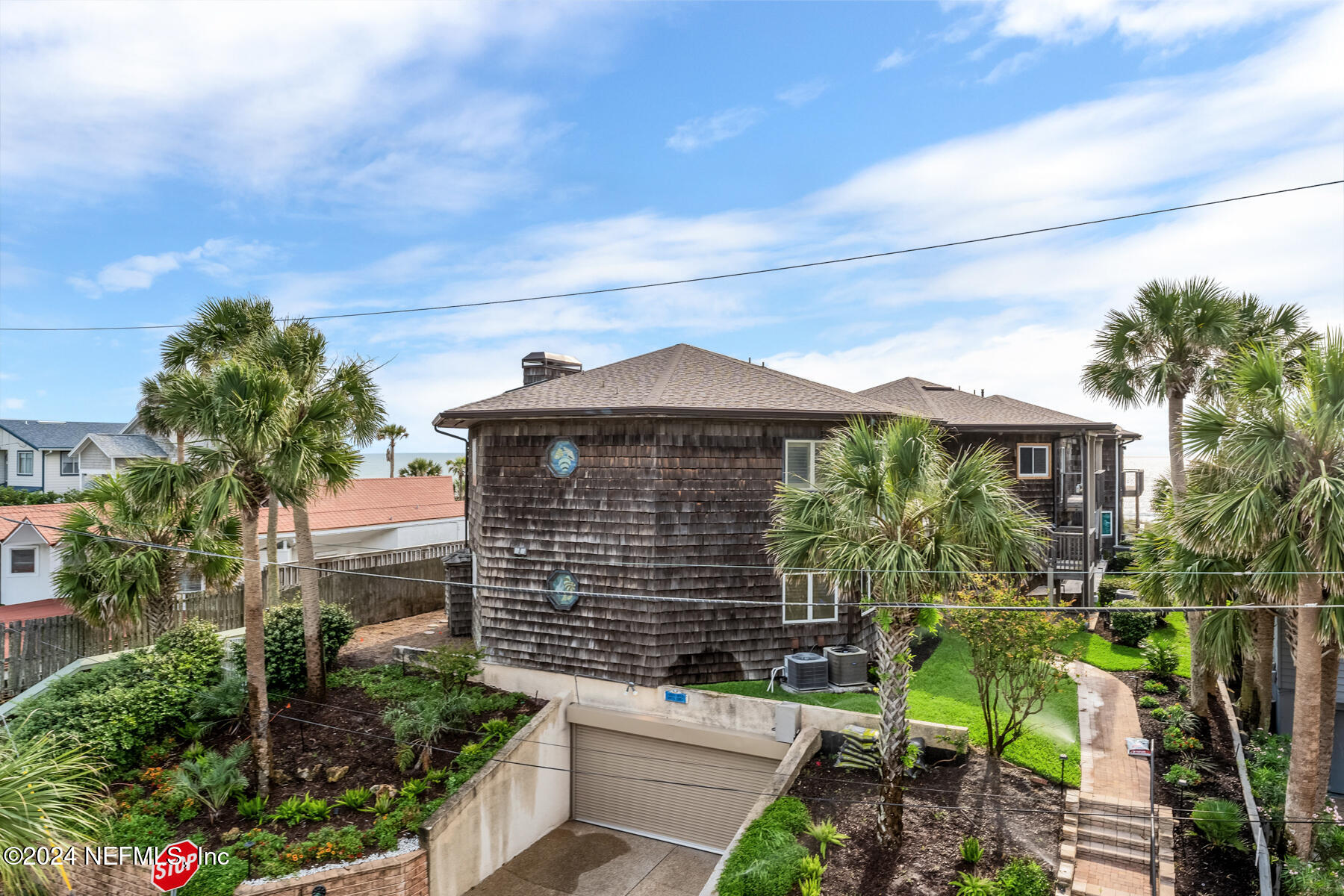 1850 Beach Avenue Atlantic Beach, FL 32233 - Photo 28 of 52 a front view of a house with a yard