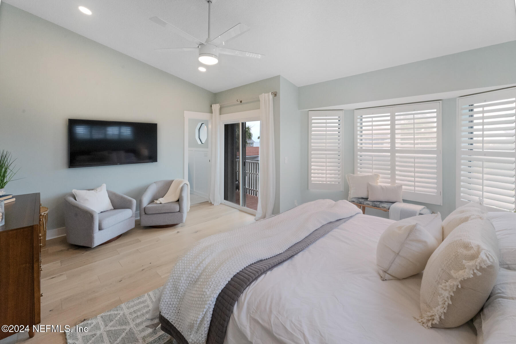 1850 Beach Avenue Atlantic Beach, FL 32233 - Photo 30 of 52 a bedroom with furniture and a flat screen tv