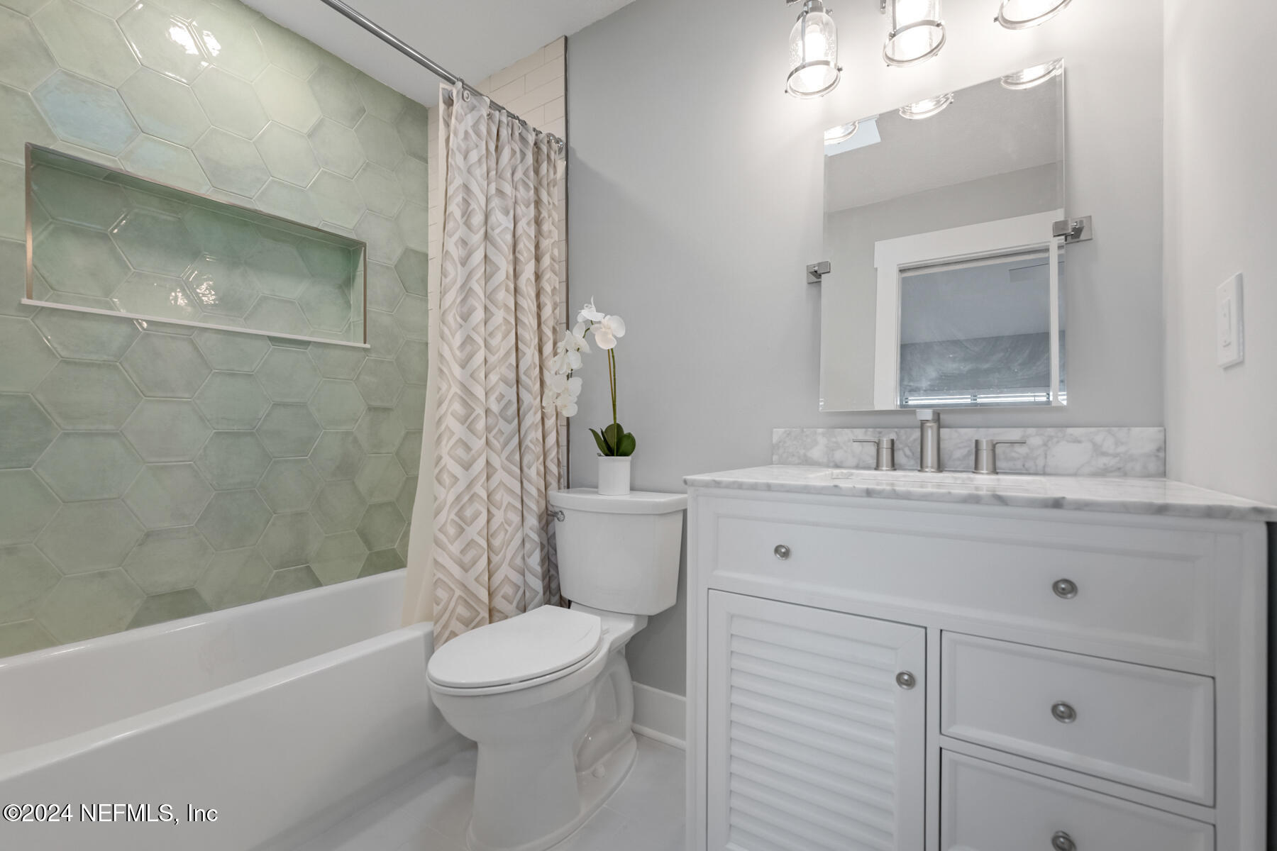 1850 Beach Avenue Atlantic Beach, FL 32233 - Photo 34 of 52 a bathroom with a sink a toilet and shower