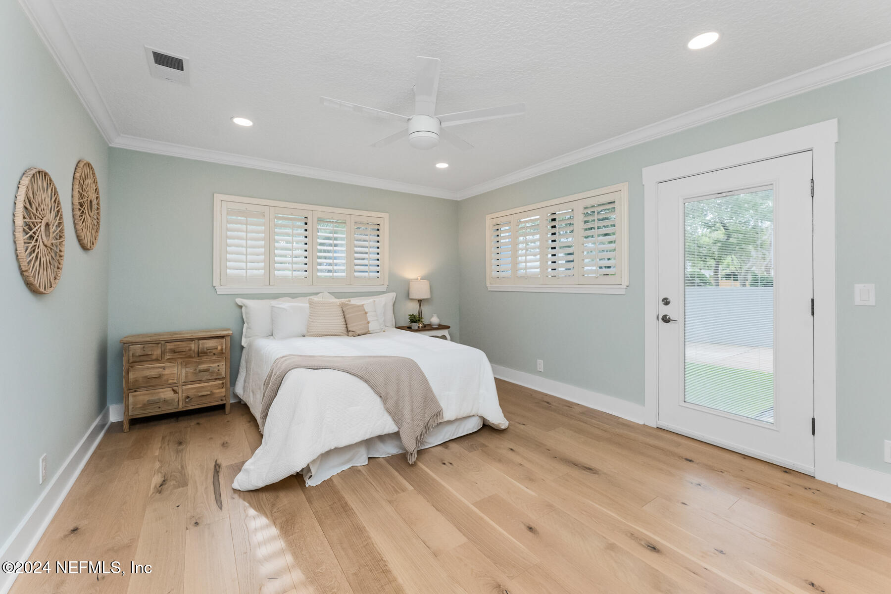 1850 Beach Avenue Atlantic Beach, FL 32233 - Photo 37 of 52 a bedroom with a bed and a window