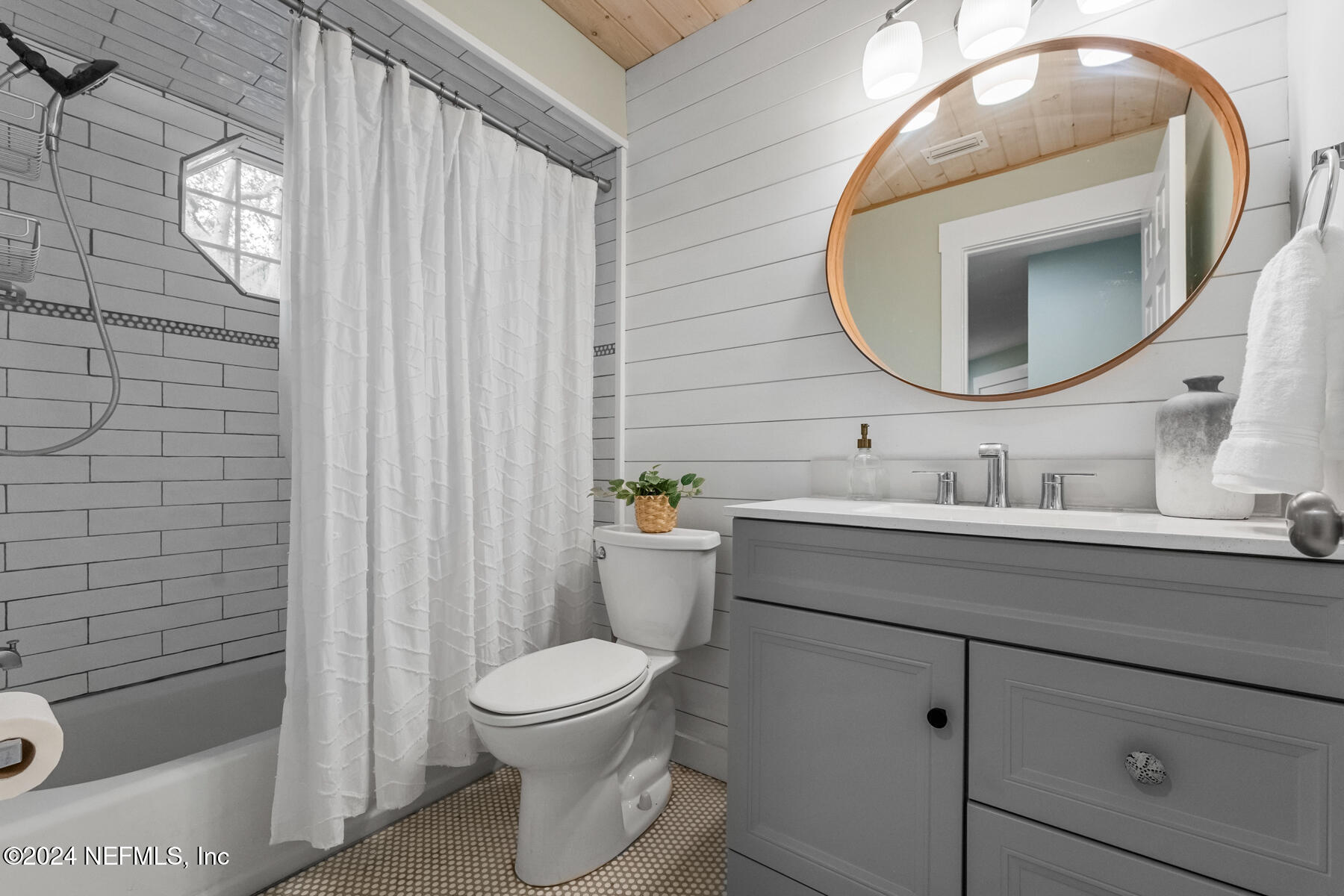 1850 Beach Avenue Atlantic Beach, FL 32233 - Photo 39 of 52 a bathroom with a sink a toilet and shower