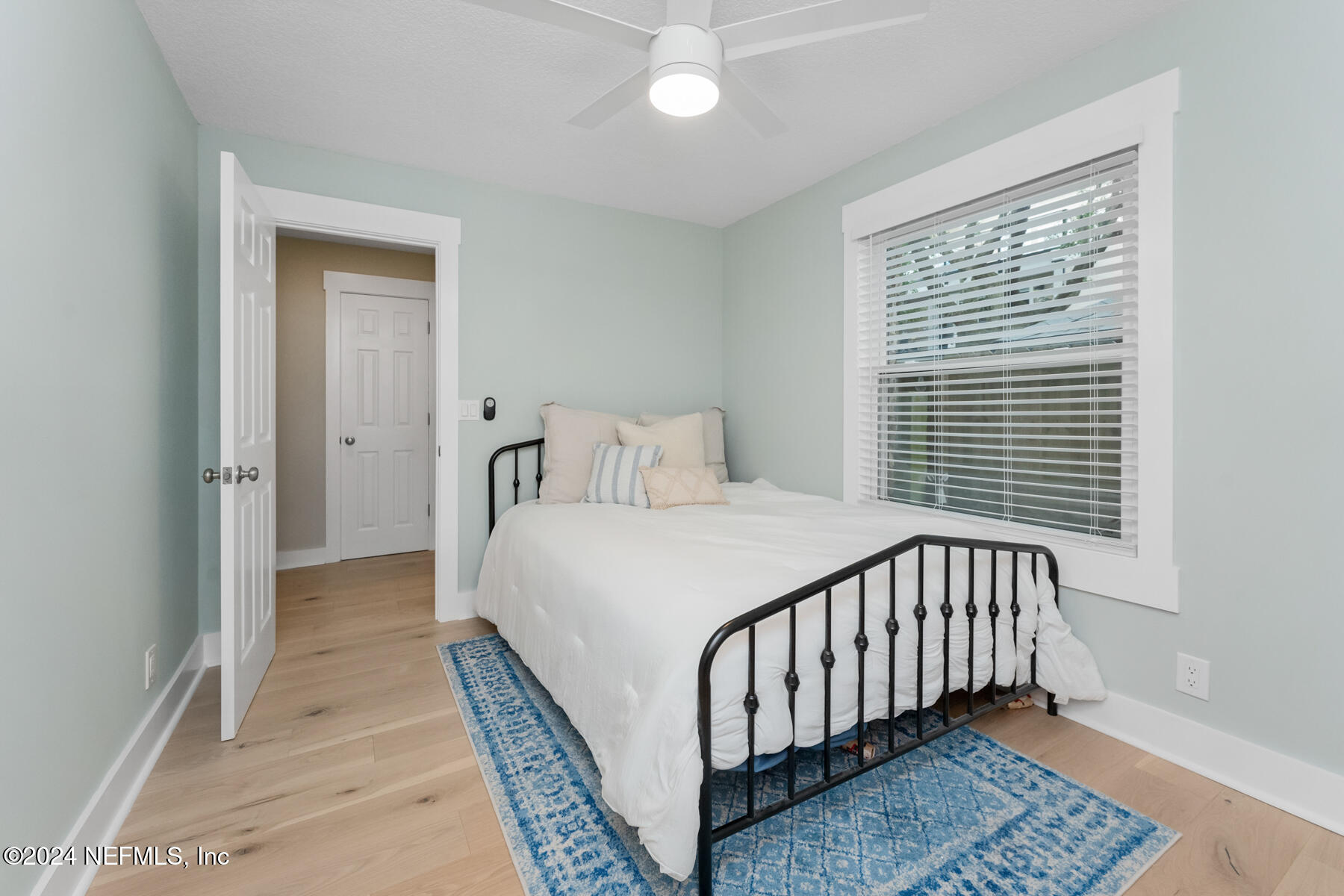 1850 Beach Avenue Atlantic Beach, FL 32233 - Photo 40 of 52 a bedroom with a bed and a window