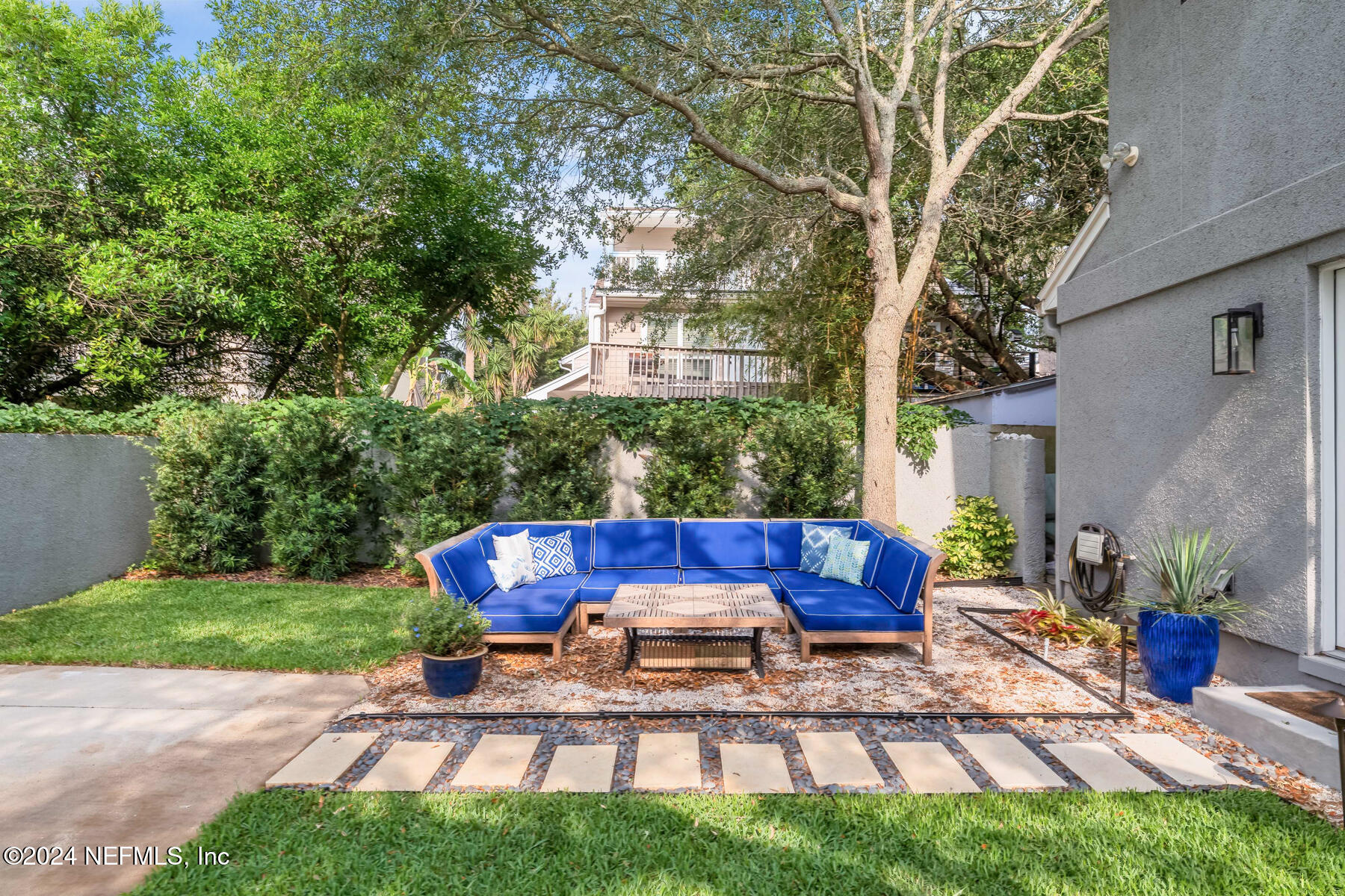 1850 Beach Avenue Atlantic Beach, FL 32233 - Photo 42 of 52 a view of a yard with furniture and a fire pit