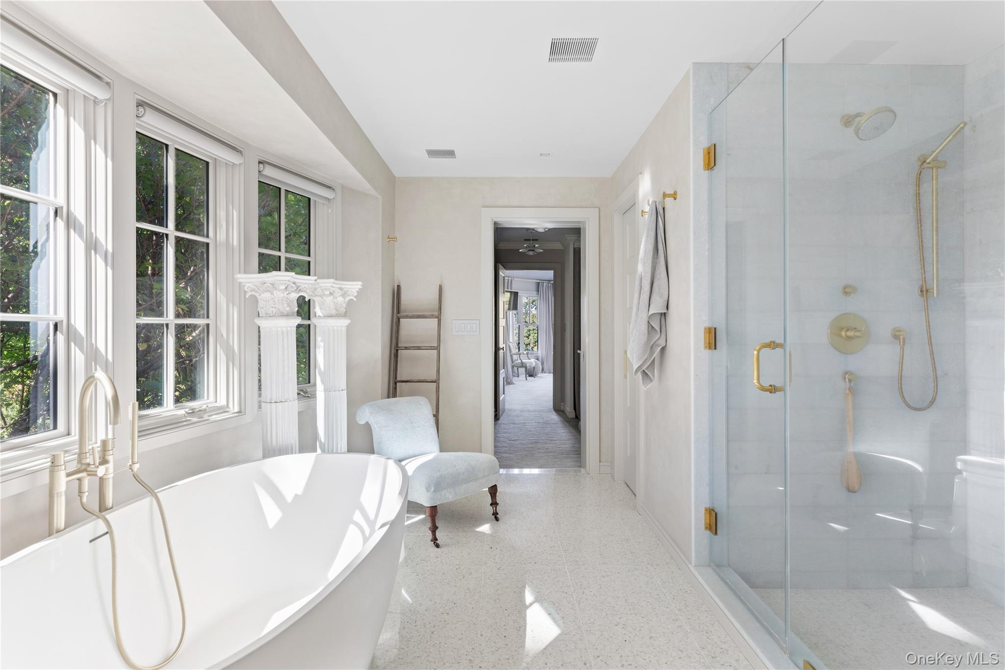 25 Soundview Lane Sands Point, NY 11050 - Photo 22 of 43 a living room with furniture and a large window