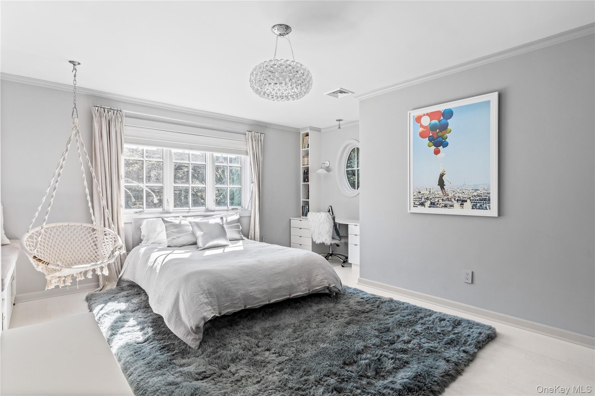 25 Soundview Lane Sands Point, NY 11050 - Photo 24 of 43 a bedroom with a bed and a window