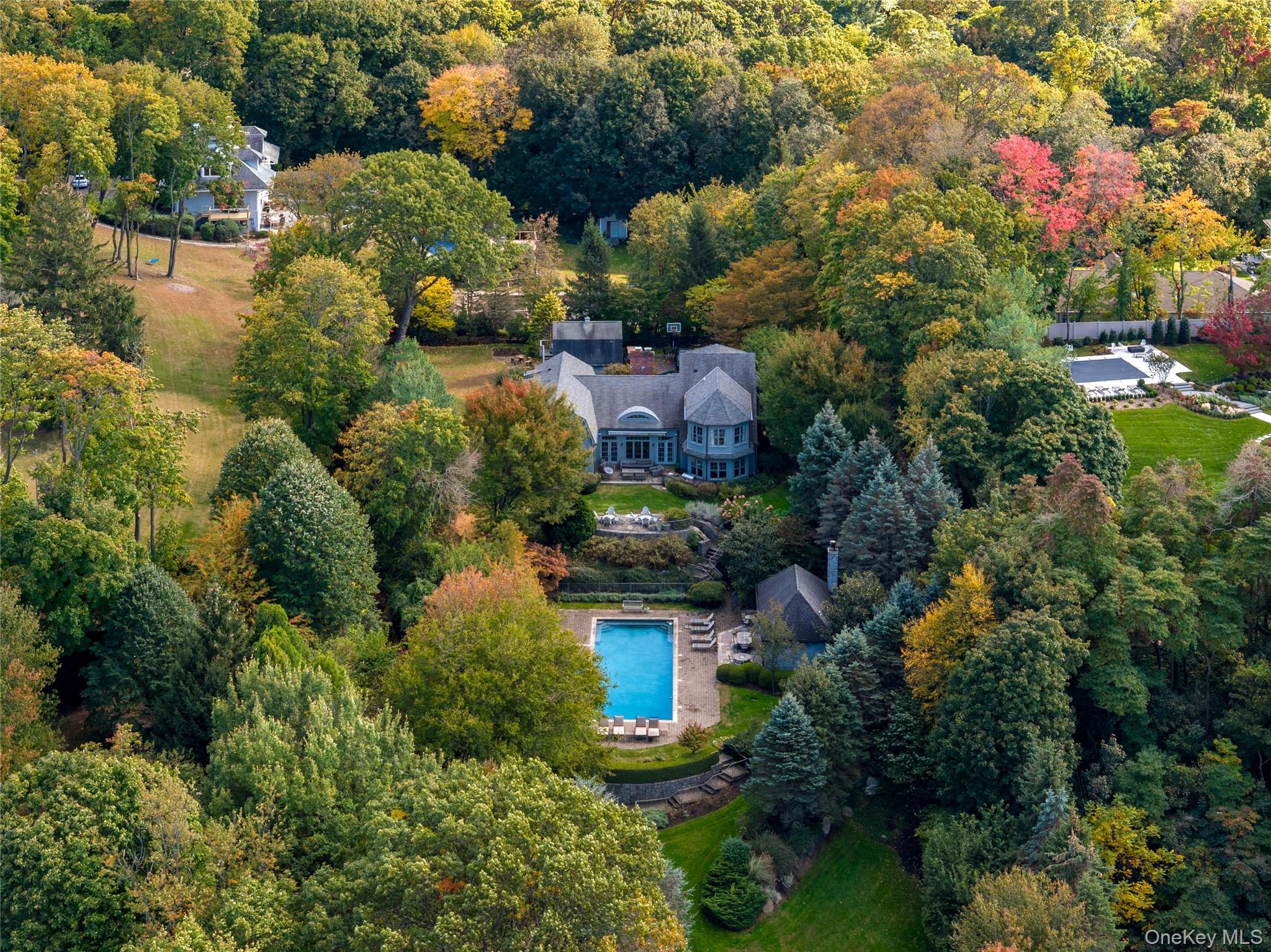 25 Soundview Lane Sands Point, NY 11050 - Photo 39 of 43 an aerial view of a house with a yard and lake view
