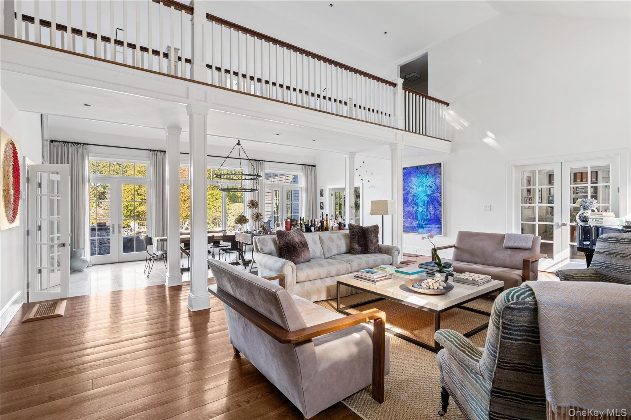 25 Soundview Lane Sands Point, NY 11050 - Photo 9 of 43 a living room with furniture or couch and a wooden floor