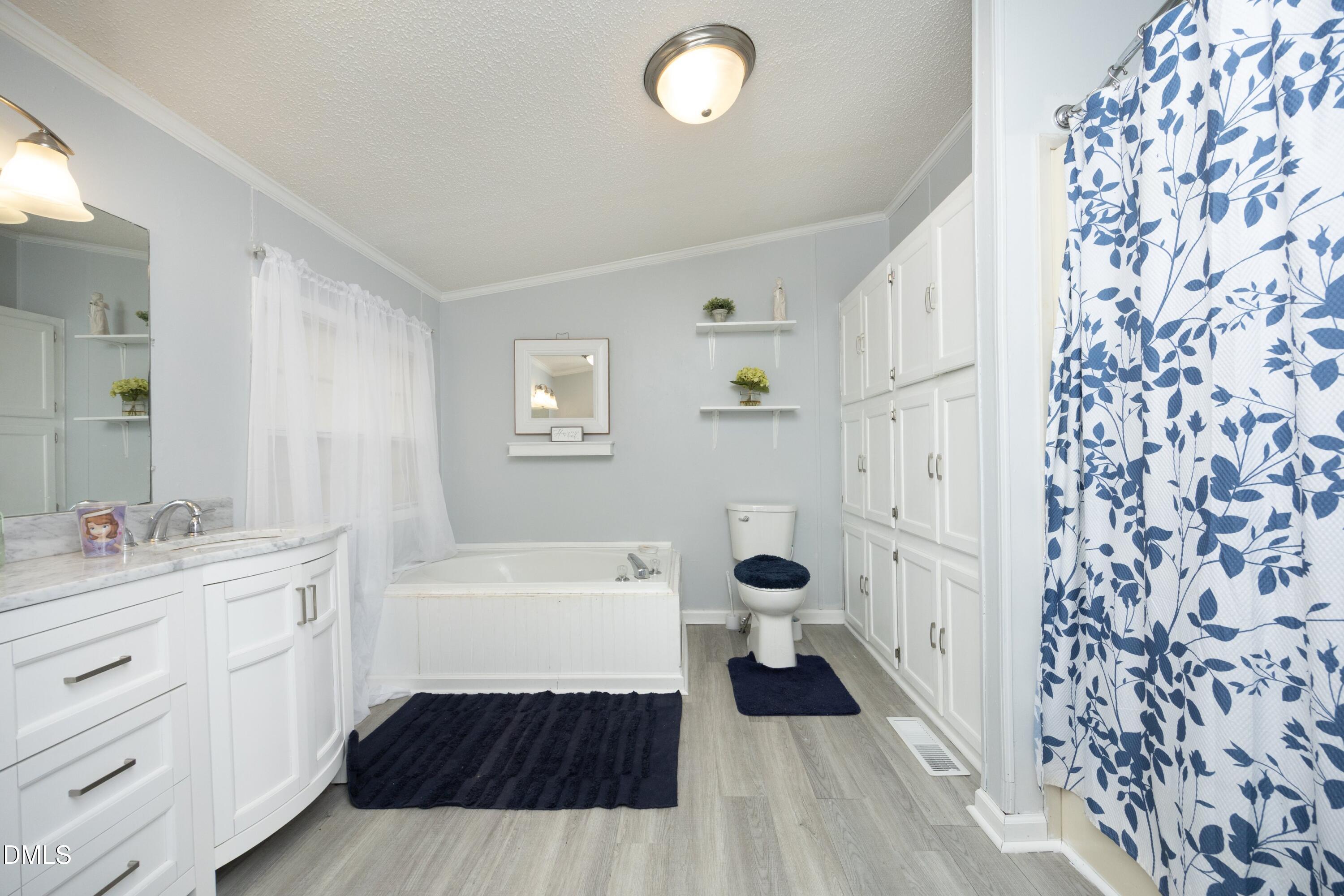 4705 Pearl Road Raleigh, NC 27610 - Photo 23 of 45 Primary Bath
