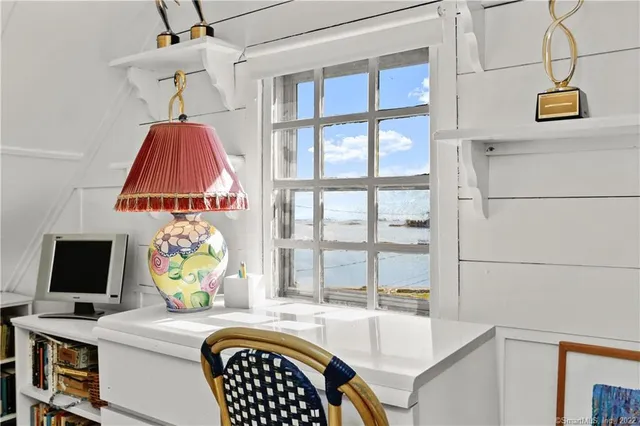 a room with a window and a table