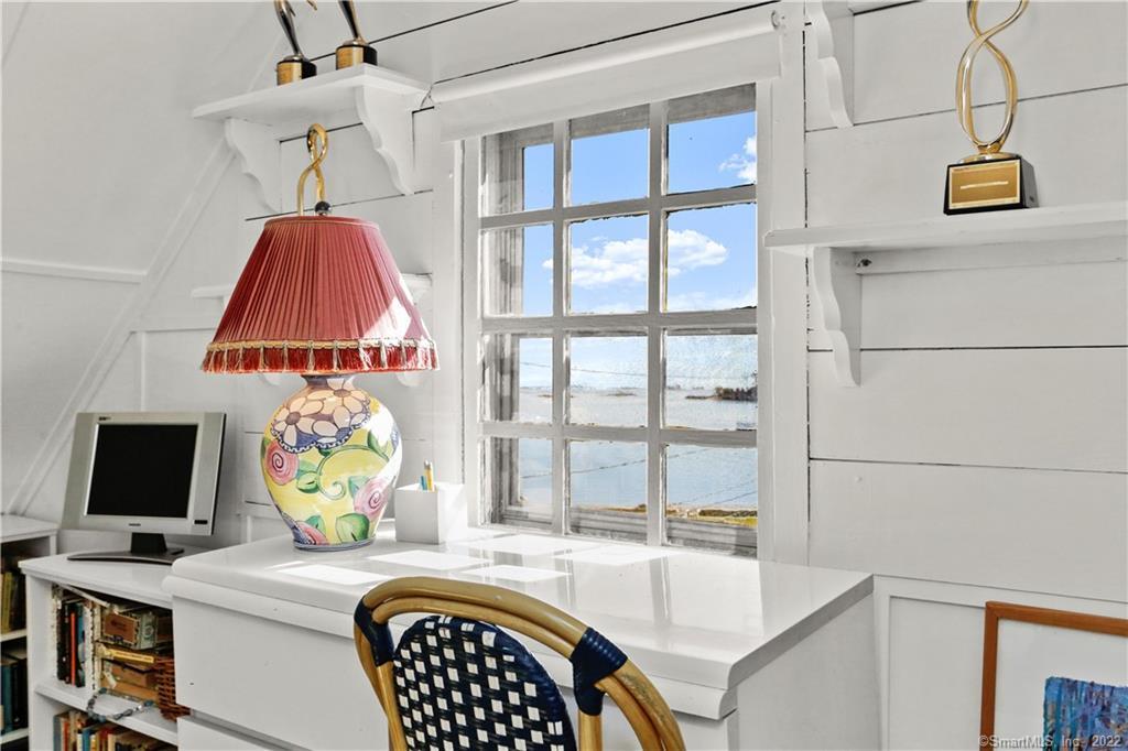 5 Parkview Road Norwalk, CT 06853 - Photo 24 of 38 a room with a window and a table