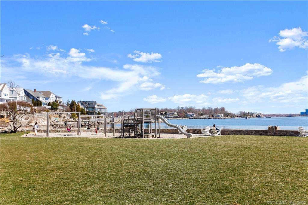 5 Parkview Road Norwalk, CT 06853 - Photo 33 of 38 a view of a lake with lawn chairs