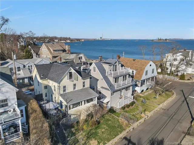 an aerial view of a house with roof view