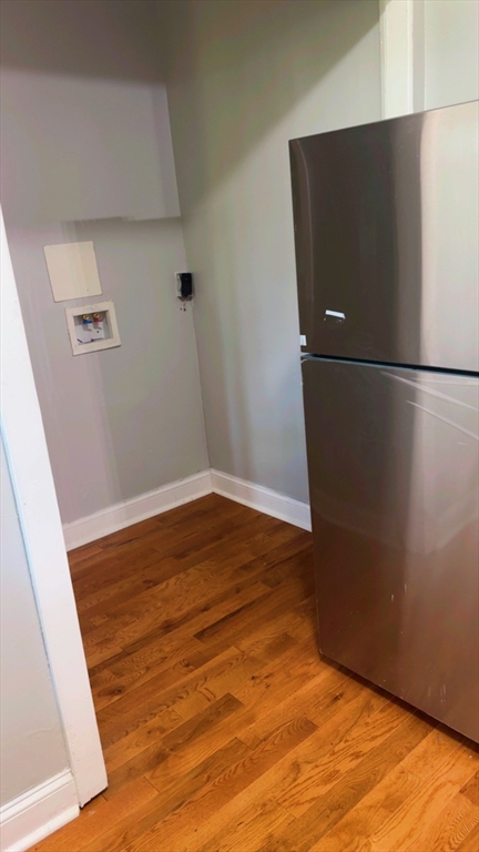 118 Longhill Street, Unit 3 Springfield, MA 01108 - Photo 11 of 24 a view of a room with wooden floor