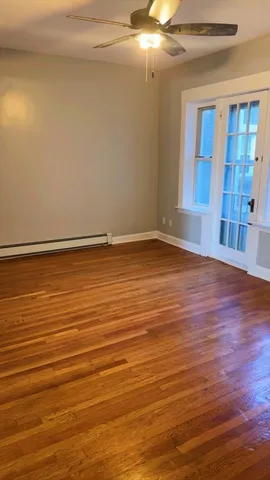 a view of an ocean & kitchen with a sink