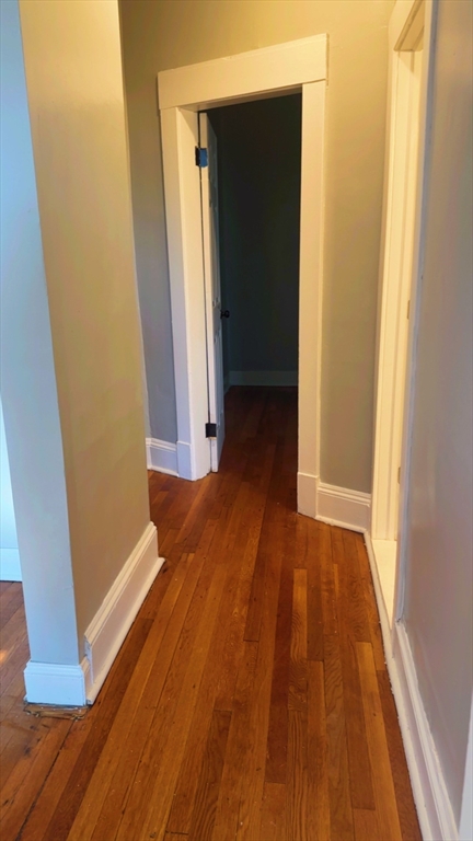 118 Longhill Street, Unit 3 Springfield, MA 01108 - Photo 19 of 24 a view of front door with wooden floor