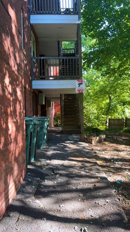 118 Longhill Street, Unit 3 Springfield, MA 01108 - Photo 4 of 24 a front view of a house with garden