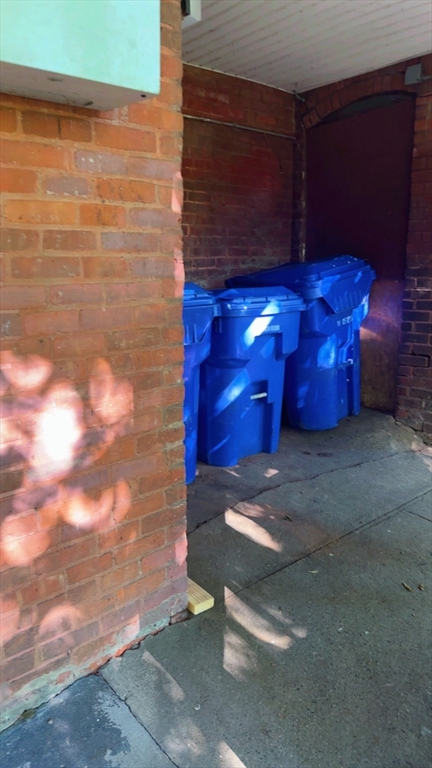 118 Longhill Street, Unit 3 Springfield, MA 01108 - Photo 7 of 24 a view of an outdoor space and fire pit