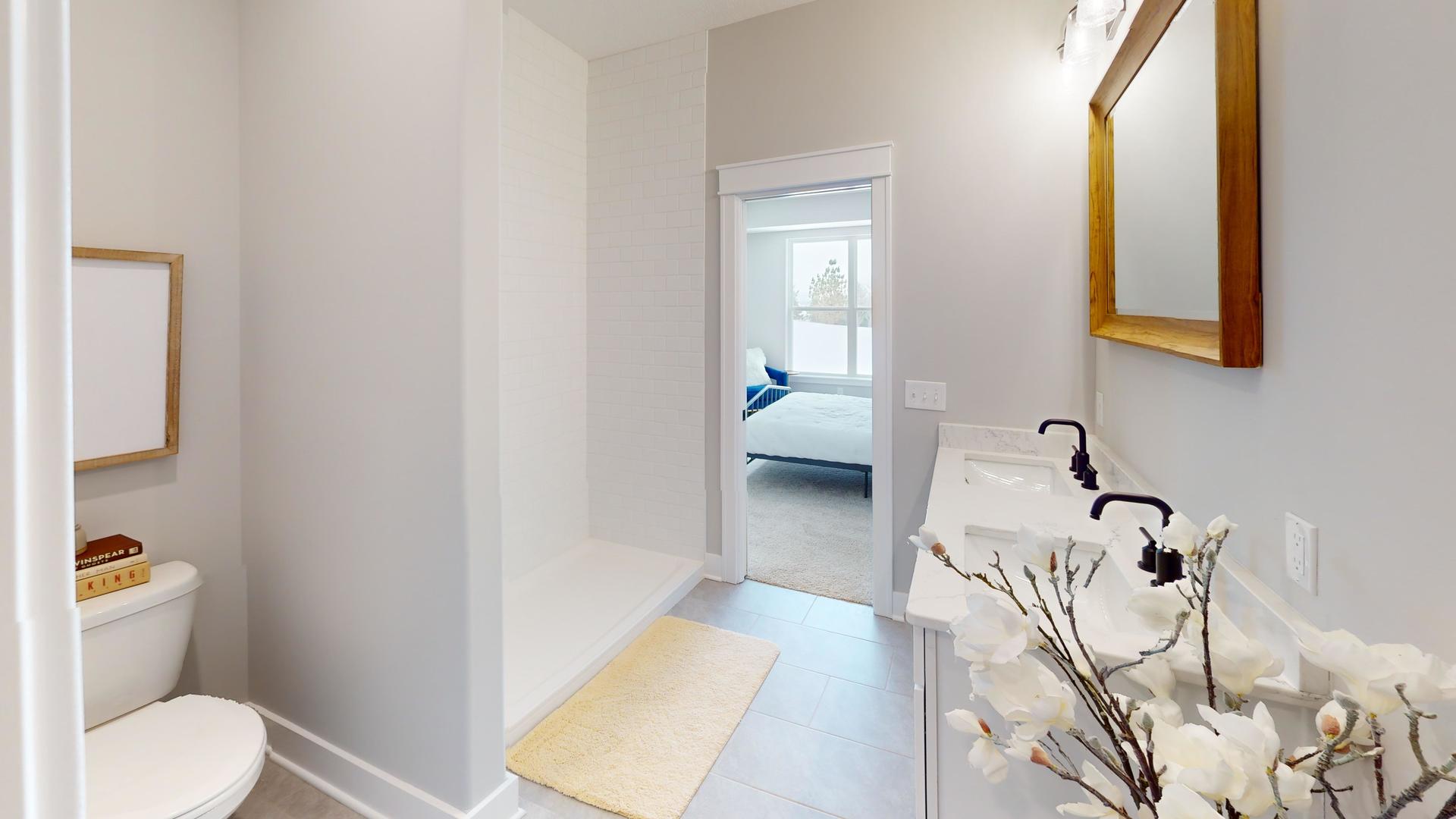 8-2 West Orchid Lane, Unit 2 Channahon, IL 60410 - Photo 10 of 28 a en suite bathroom with a toilet