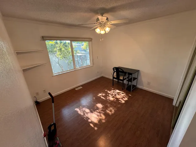 a view of a livingroom with a window